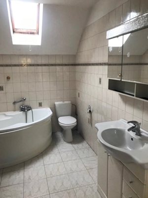 Bad einer Wohnung im Haus